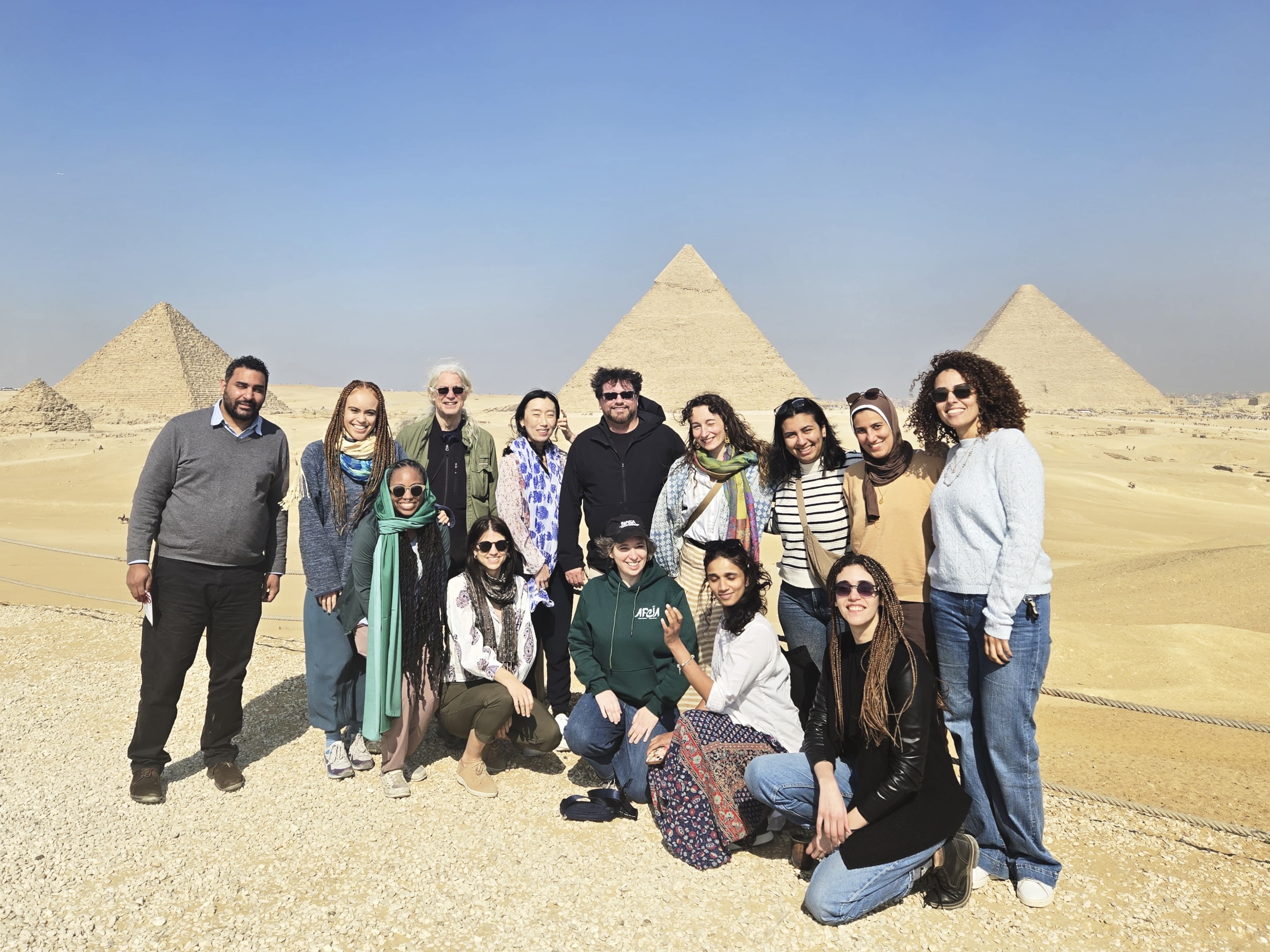 Matthew Burtner and Time Lapse Dance company in front of the Pyramids.