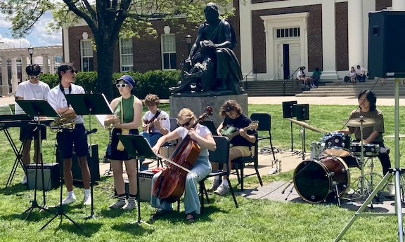 Students playing music on the Lower Lawn