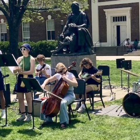 Group of UVA Student Musicians performing on The Lawn, homer flat